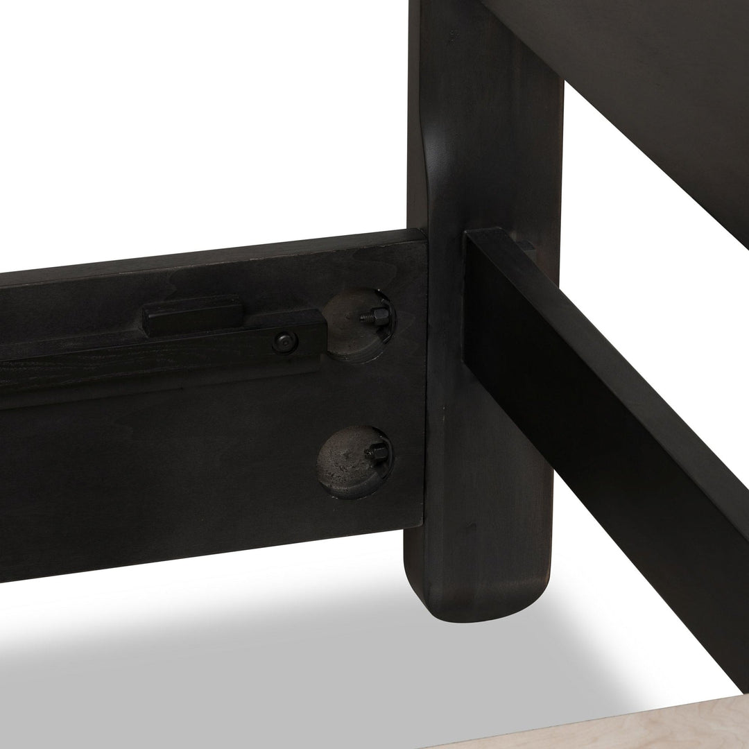 Xolani Wood Platform Bed in Jaguar — close-up of the rail fitting