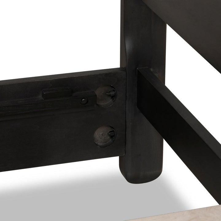 Xolani Wood Platform Bed in Jaguar — close-up of the rail fitting
