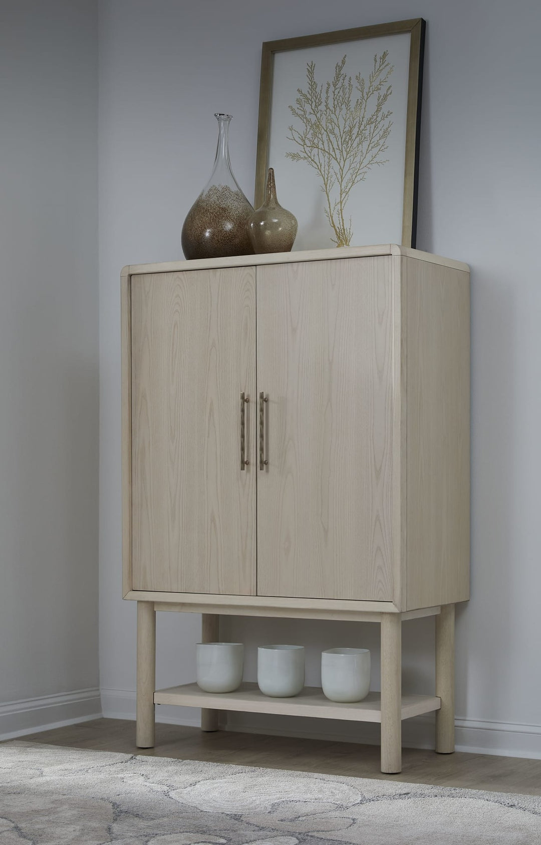 Zinnia Bar Cabinet in White Sand — lifestyle photo