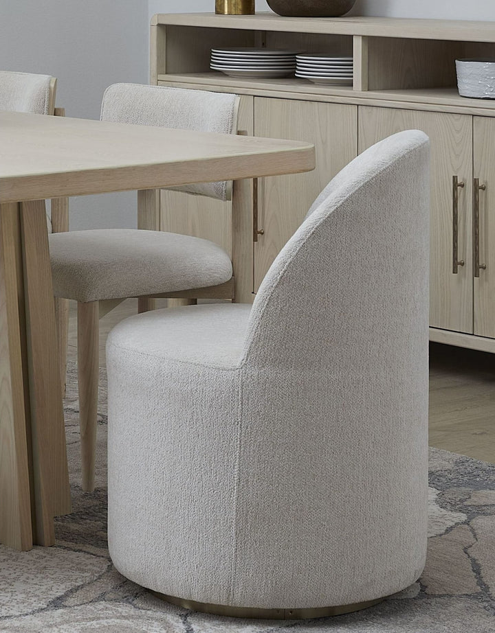 Zinnia Fully Upholstered Swivel Dining Chair in Dune Chenille — lifestyle photo