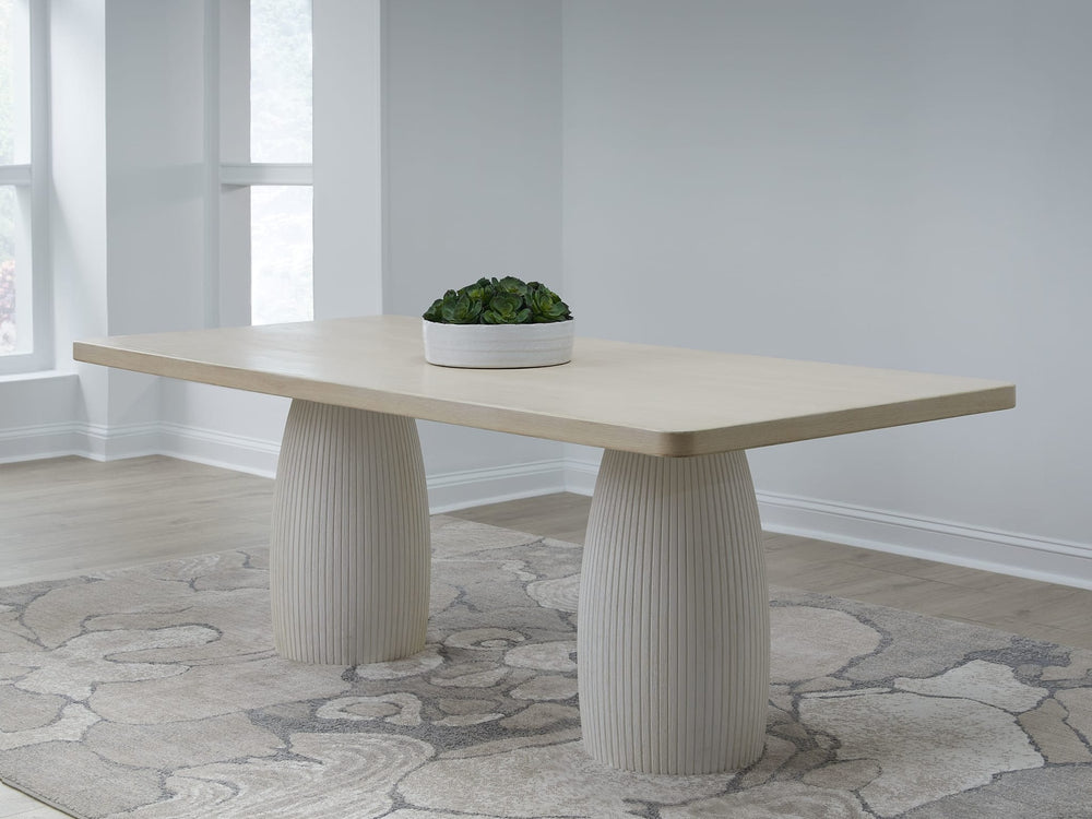 Zinnia Plaster Base Dining Table in White Sand and Ivory — lifestyle photo