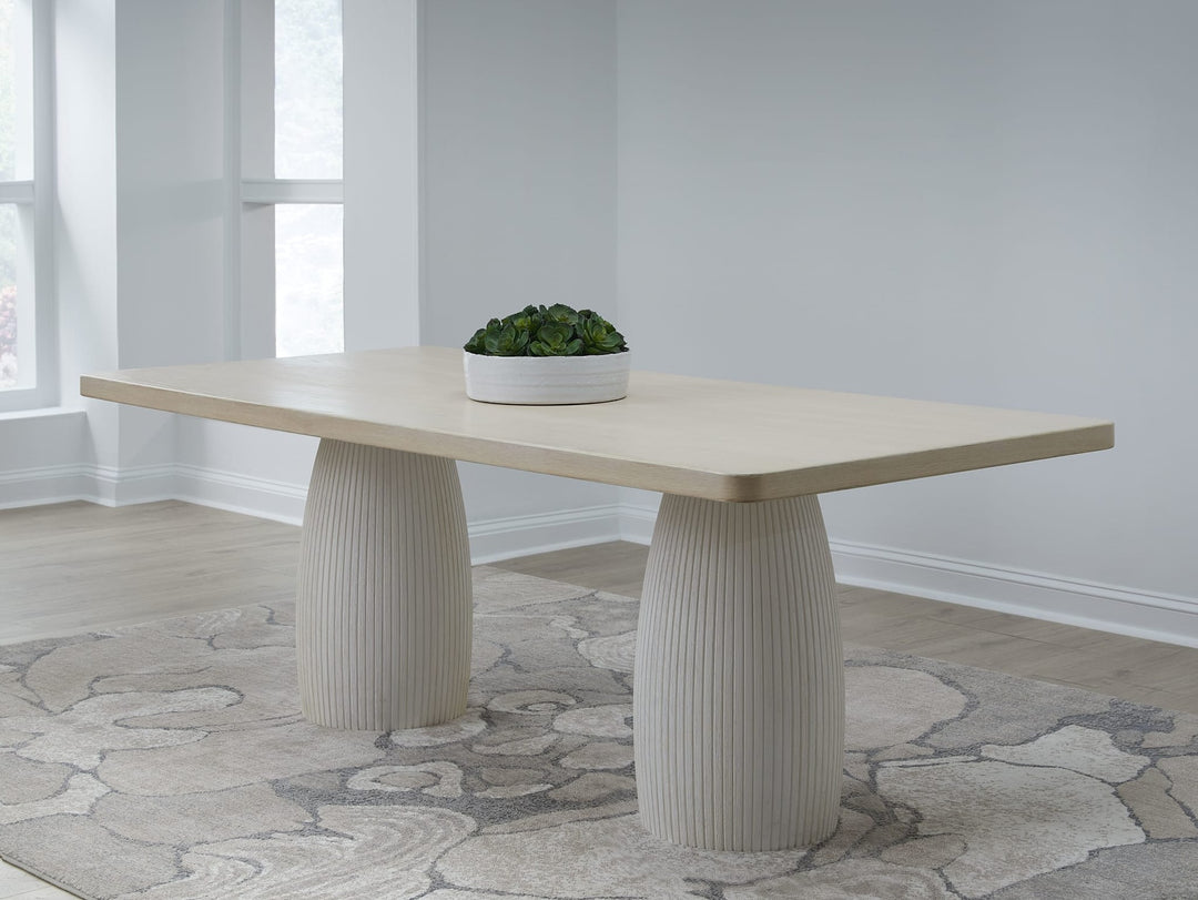Zinnia Plaster Base Dining Table in White Sand and Ivory — lifestyle photo