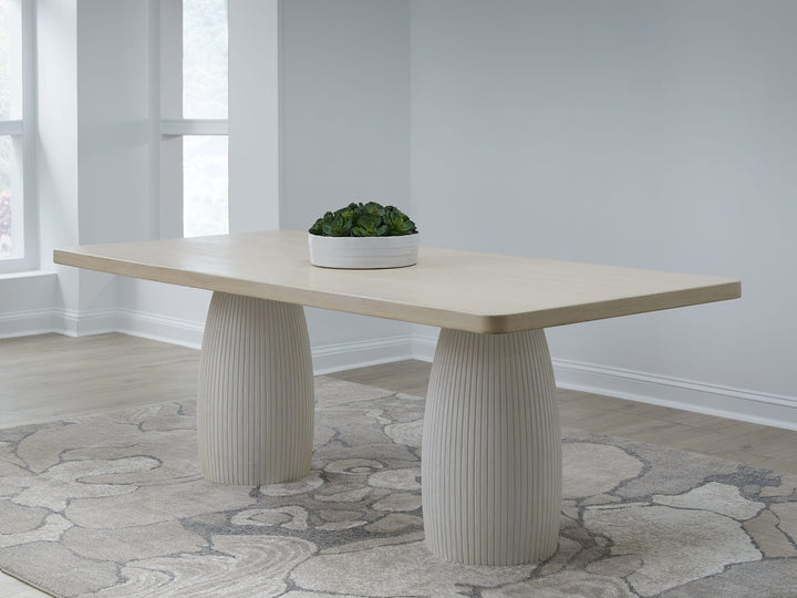 Zinnia Plaster Base Dining Table in White Sand and Ivory — lifestyle photo