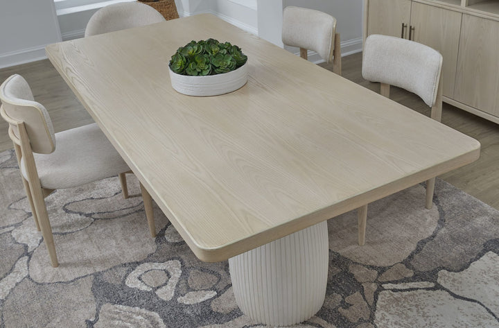 Zinnia Plaster Base Dining Table in White Sand and Ivory — lifestyle photo