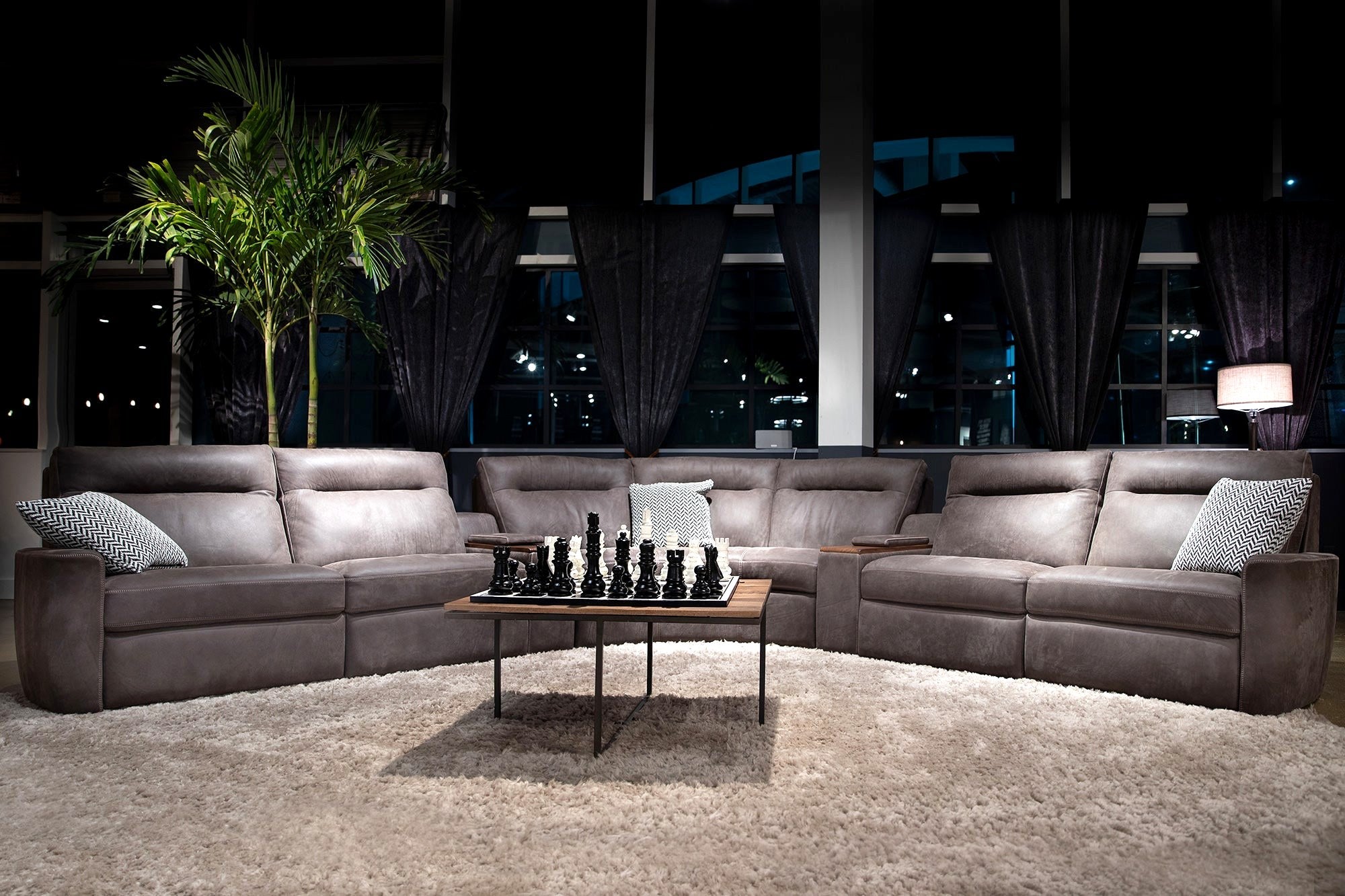 American Leather Keystone motion sofa in a dramatic living room