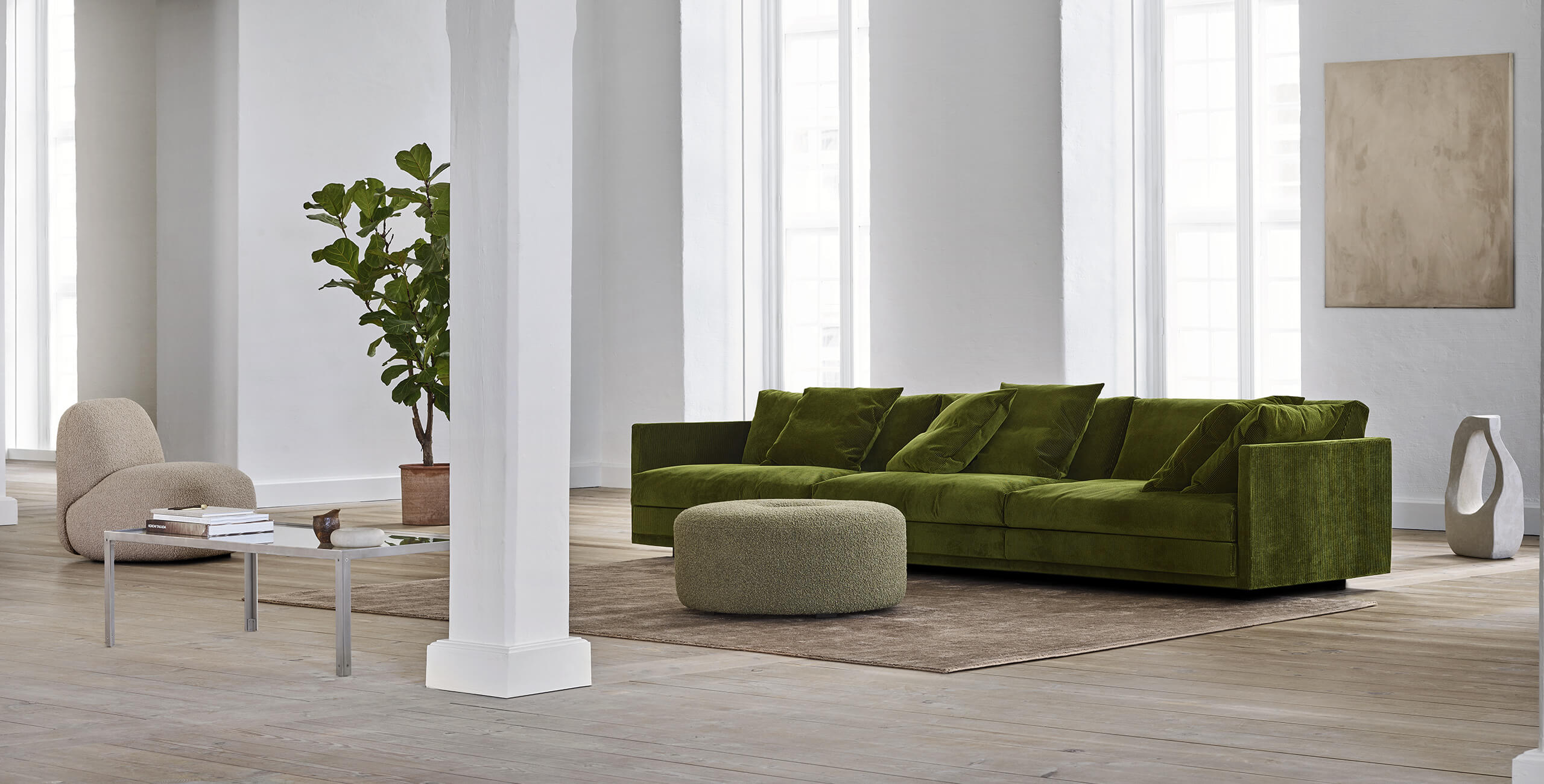Great Ash sofa with Havana chair in a copper-framed room