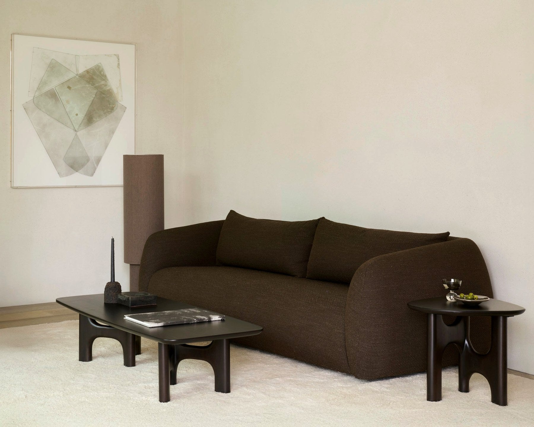 Ethnicraft Flow and Abstract coffee tables in a modern living room