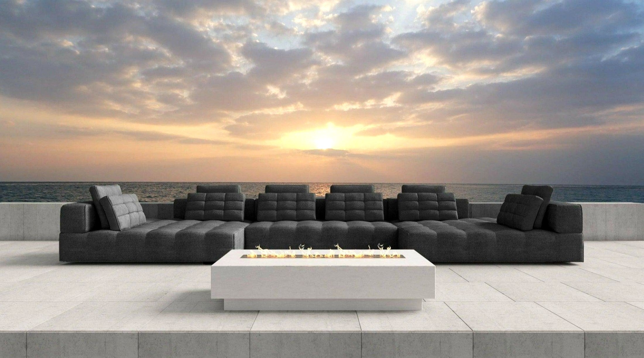 Lawrence outdoor sectional on a coastal sunset terrace with fire table
